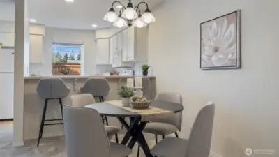Convenient breakfast bar provides additional dining space.