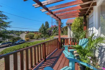 Relax on the front deck looking west to wonderful sunsets in the panoramic territorial view.