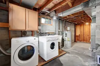 Laundry and utility room. Water heater new in 2024.