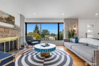 Light and bright from new double-glazed windows showcasing wonderful views to the east. Central A/C installed too.