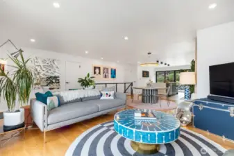 Open living layout with a seamless flow from living and dining into the huge kitchen.