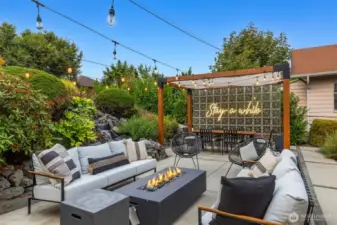 Full landscape renovation with custom gazebo, waterfall, lighting, hot tub and shed.