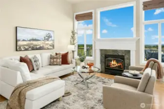 Gas fireplace with a wall of windows.