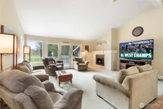 Door to deck and lots of windows for taking in the golf course view