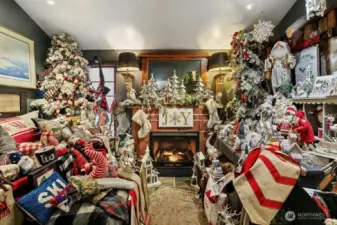 Additional building with fireplace currently being used as part of Christmas Shop business.