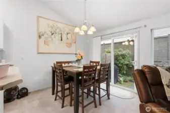 Dining area convenient to side yard in case you want to do some BBQing.
