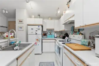 Plenty of storage and counterspace.  The door on the left goes out to the 2-car garage.