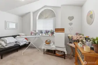 Bedroom two - window looks out to the front of the home.