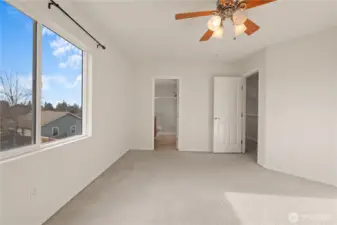Primary bedroom with en suite and walk in closet.