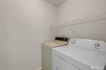 Laundry room conveniently located upstairs.