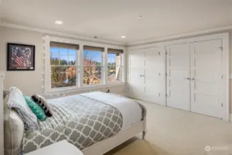 Spacious bedrooms have en-suite bathrooms and large closets