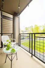 Enjoy breakfast or BBQ on attached kitchen balcony.