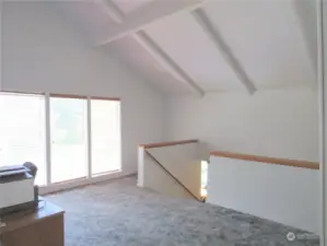 Vaulted Upper Living Room w/Wall of Windows