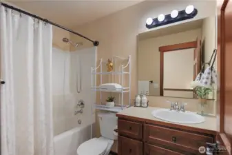 The second full bathroom conveniently serves the remaining upstairs bedrooms