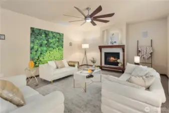 Light-filled, this oversized living room features a cozy gas fireplace and soaring ceilings anchored by two tall picture windows that frame serene views of the private yard and lush greenbelt. A perfect space for gatherings or quiet moments at home