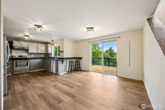 Kitchen and dining area, slider to back deck