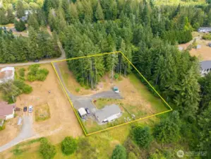 1.53 acre lot with a carport and shed.
