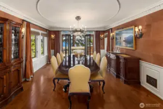 The dining room is set for formal dining and dinner parties.