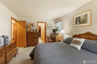 Primary Bedroom leading to en suite and large walk-in closet
