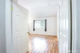 Welcome to the primary room! Love the french door entry!