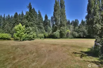 Northeast corner of the lot. The property to the east of this one has paths that neighbors are welcome to enjoy. The trails go through several neighborhing properties.