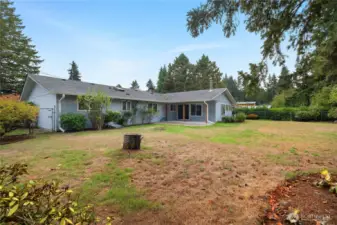 Spacious, fully fenced backyard offering privacy and room to relax or play.