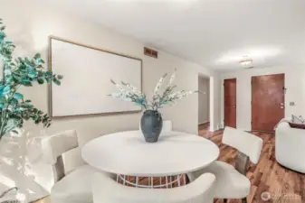 Dining room looking towards front door, with living room on the right. If you have a crowd, you can extend the table into the living room so there's space for everyone.