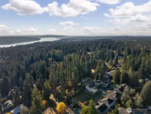 Aerial view looking southeast. Lake Washington is on the left, and Seattle is in the distance to the right. This Enjoy privacy without sacrificing convenience. Light Rail at 185th Street offers fast connections to downtown Seattle and Sea-Tac Airport. Lake Washington is on the left in the distance, and Seattle is on the right in the distance.