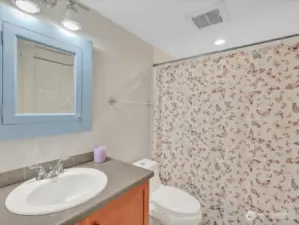 Full bathroom off hallway, also offering many upgrades!