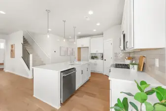 Photographs are for illustrative purposes only. Features, finishes, interior/exterior colors, landscaping and floorplan shown may vary from actual homes built.