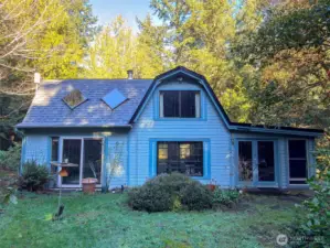 Welcome to a peaceful, private property of almost 4 acres with the cozy home situated in the middle.