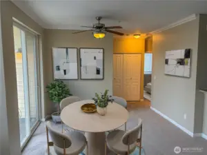 (Virtually Staged) Dining area with space for hosting, seamlessly connected to the living room for effortless everyday living.