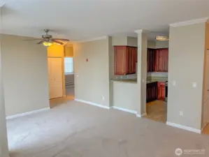 Expansive living area emphasizing comfort, functionality, and natural light.