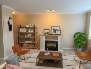 Living room centered around a cozy gas fireplace—ideal for relaxing evenings at home.