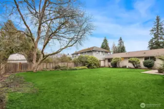 Large private flat fenced backyard.