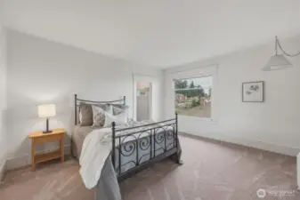 Second-floor bedroom with beautiful bay views and adjoining sun porch