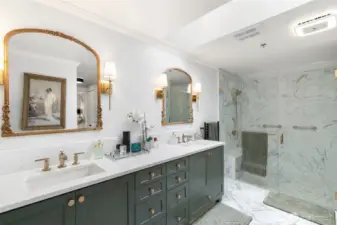 All new cabinets and counter, heated towel rack and oversize walk-in shower with no rise... easy access.  Two shower heads and bench seat.