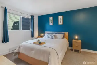 The bedroom is spacious enough for your largest bed