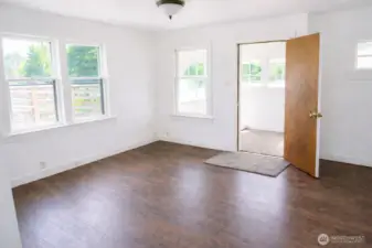 Nice & open living space directly off your covered front porch. *Images from before current tenancy - home is a fixer*.