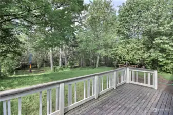 View of your expansive back yard from your large deck.