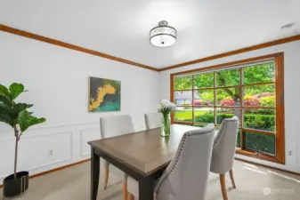 Full Size Dining Room with Wainscoting, Chair Rail, Original Wood Trim and Nature Views
