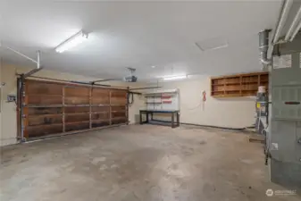 Two car garage with tons for room for extra storage.