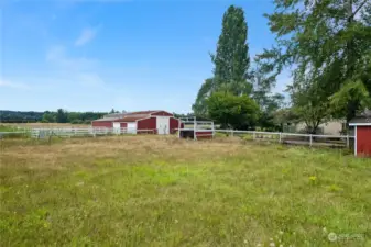 Outdoor arena is located just outside the horse barn.