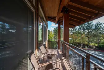 Dual patio sliders out to your viewing deck, one off the living room and the other off the primary bedroom.