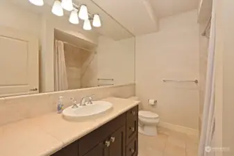 This main bath also has a good size linen closet as you walk in to the right (not seen).