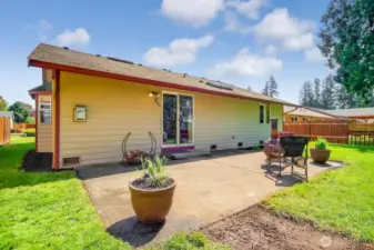 The large back patio is the perfect spot for summer entertaining!