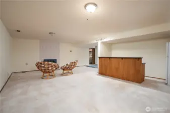 Rec room has built in bar and a fridge