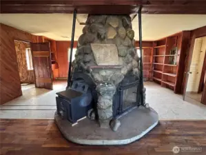 Central Fireplace, Bathroom door on Right - Backroom Entrance to Hot tub & Add'l Room on Left