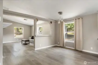Open-concept dining area seamlessly connected to the family room, perfect for entertaining and everyday living