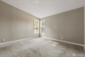 Spacious primary bedroom featuring a private ensuite bathroom